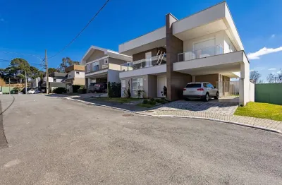 Casa de alto padrão em condomínio fechado – 4 suítes, piscina e energia solar em santa felicidade