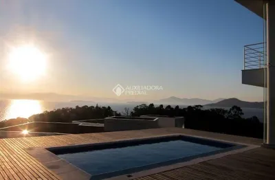 Casa em condomínio fechado com 3 quartos à venda na rodovia haroldo soares glavan, 4430, cacupé, florianópolis, 461 m2 por r$ 6.500.000