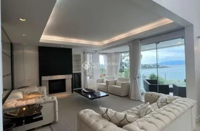 Casa em condomínio fechado com 6 quartos à venda na rodovia haroldo soares glavan, 4450, cacupé, florianópolis, 991 m2 por r$ 10.500.000