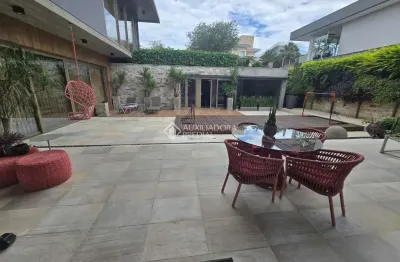 Casa em condomínio fechado com 4 quartos à venda na rodovia haroldo soares glavan, 1760, cacupé, florianópolis, 842 m2 por r$ 15.000.000