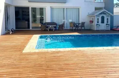 Casa em condomínio fechado com 4 quartos à venda na rodovia admar gonzaga, 3180, itacorubi, florianópolis, 344 m2 por r$ 3.920.000
