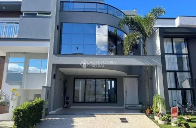 Casa em condomínio fechado com 4 quartos à venda na avenida deltaville, 150, beira rio, biguaçu, 320 m2 por r$ 1.890.000