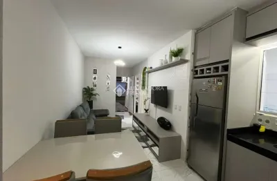 Casa em condomínio fechado com 3 quartos à venda na Avenida Paulo Roberto Vidal, 2494, Bela Vista, Palhoça, 62 m2 por R$ 380.000