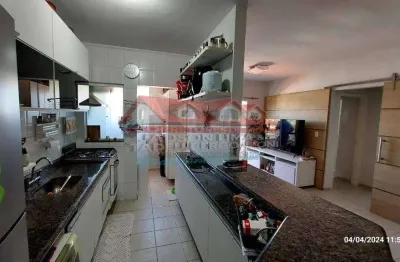 Apartamento de 2 quartos com suíte e vaga de garagem no centro de caraguatatuba-sp: imperdível oportunidade de investimento!