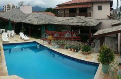 Linda casa na prainha na martim de sá, dispondo de 4 dormitórios, 3 suítes.