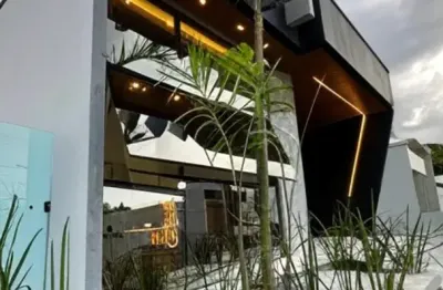 Vendo belíssima casa de 3 suítes no condomínio porto marina.