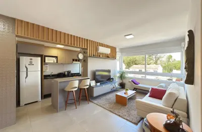 Apartamento semimobiliado com 88,97m², 3  suítes, churrasqueira e 2 vagas cobertas.