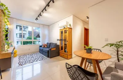 Apartamento semimobiliado de 2 dormitórios com suíte e vaga