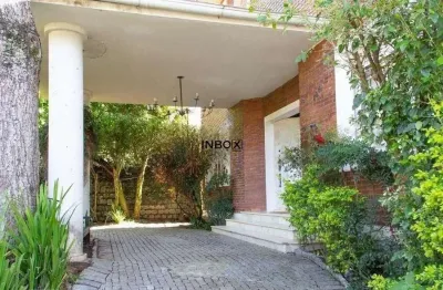 Linda casa de 800m², 6 dormitórios suítes, 6 banheiros, 5 vagas de garagem no bairro três figueiras