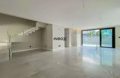 Casa moderna em condomínio fechado - 3 suítes e 4 vagas
