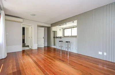 Apartamento semimobiliado com 109m², 3 dormitórios, suíte e garagem