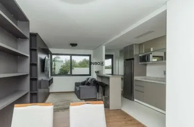 Apartamento mobiliado de 1 dormitório, suíte, com 49 m² de área privativa, 1 vaga