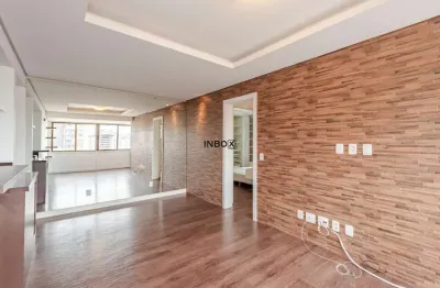 Apartamento com 70m² de área privativa, semimobiliado, de 2 dormitórios, suíte, 2 vagas