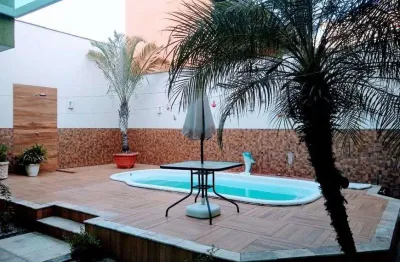 Espetacular casa em condomínio de alto padrão, cachamorra