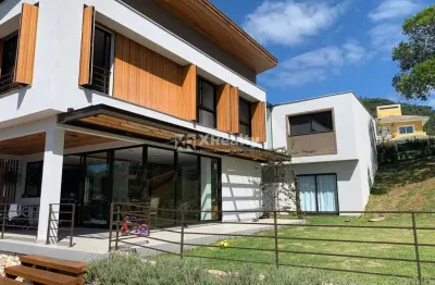 Casa em condomínio fechado com 4 quartos à venda na rodovia doutor antônio luiz moura gonzaga, 647, rio tavares, florianópolis por r$ 6.990.000