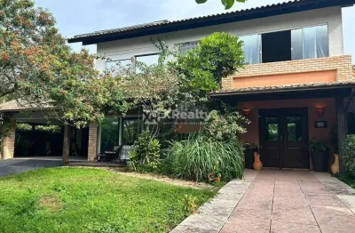 Casa em condomínio fechado com 4 quartos à venda na rodovia doutor antônio luiz moura gonzaga, 135, rio tavares, florianópolis por r$ 5.900.000