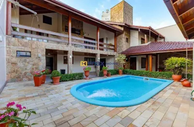 Casa ampla, semi mobiliada com 4 quartos (1 suíte master) e piscina à venda no bairro dom bosco em itajaí