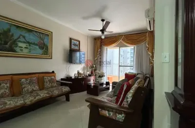 Apartamento à venda na praia grande, 2 dormitórios, suíte, garagem, vista para o mar.