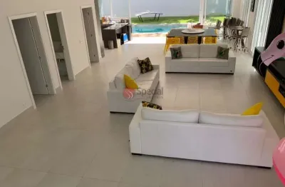 Casa na riviera com 5 suítes climatizadas, 6 vagas.