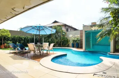 Sobrado de alto padrão com 4 suítes, piscina aquecida e gourmet – carandá bosque