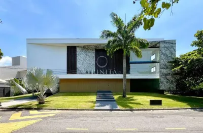 Mansões: casa triplex de primeira locação em estilo contemporâneo, com 5 suítes, subsolo e elevador.