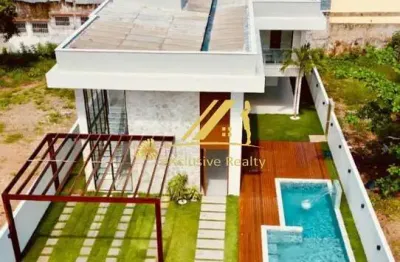 Oportunidade- casa de luxo mobiliada em guarajuba, a 200m da praia, no condomínio paraíso! 7 suítes, piscina com hidro e cascata. agende sua visita