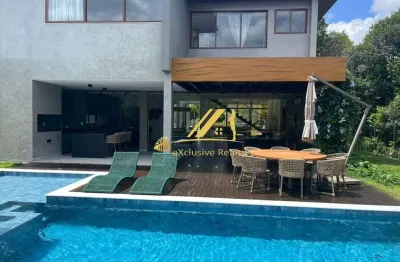 Casa com arquitetura moderna em praia do forte, localizada em condomínio com infraestrutura completa. situada em rua exclusiva (sem saída) e implantad