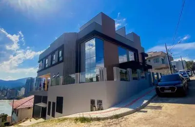 Casa com 4 quartos à venda no Canto da Praia, Itapema 