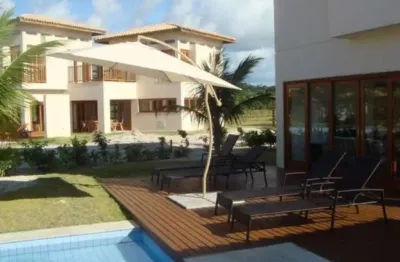 Luxuosa casa à venda em mata de são joão-ba, com 4 quartos, 4 suítes, 6 banheiros, 3 vagas de garagem e 340m² de área.