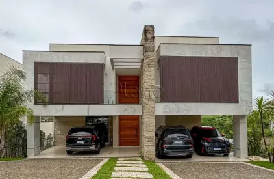 Casa à venda com 4 suítes no Residencial Jatibela, Campinas.