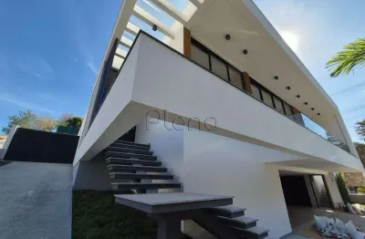 Sobrado à venda com 4 suítes no loteamento alphaville campinas, campinas.