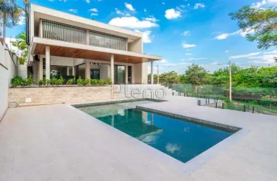 Casa à venda com 4 suítes no residencial jatibela, campinas.