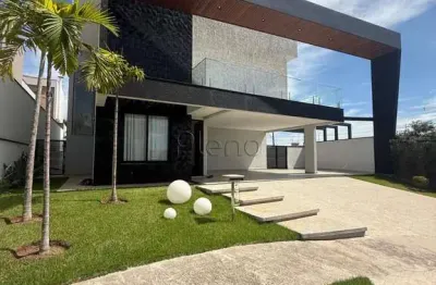 Sobrado à venda em campinas, loteamento parque dos alecrins, com 3 suítes, com 315 m²