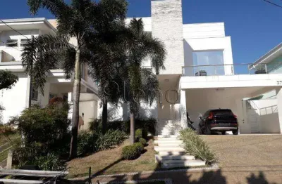 Sobrado à venda em valinhos, santa cruz, com 3 suítes, com 302 m², residencial terras do caribe