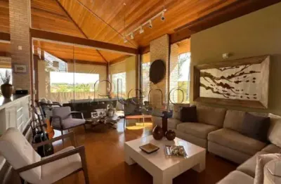 Sobrado à venda em campinas, loteamento alphaville campinas, com 4 suítes, com 430 m²