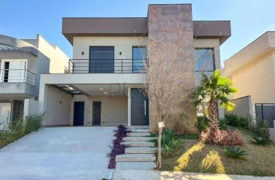 Sobrado à venda em campinas, loteamento parque dos alecrins, com 3 suítes, com 290 m²