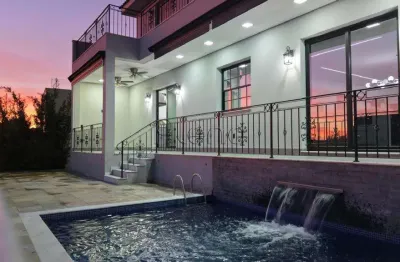 Sobrado à venda em campinas, alphaville dom pedro, com 5 suítes, com 455.87 m²