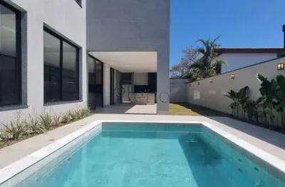 Sobrado à venda em campinas, loteamento parque dos alecrins, com 4 suítes, com 340 m²
