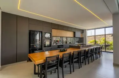 Sobrado à venda em campinas, loteamento parque dos alecrins, com 3 suítes, com 290 m²