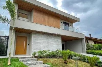 Sobrado à venda em campinas, loteamento alphaville campinas, com 4 suítes, com 333.5 m²