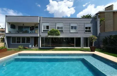 Casa à venda e para alugar em Campinas, Loteamento Caminhos de São Conrado (Sousas), com 5 suítes