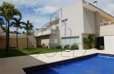 Sobrado à venda em campinas, loteamento alphaville campinas, com 4 suítes, com 410 m²