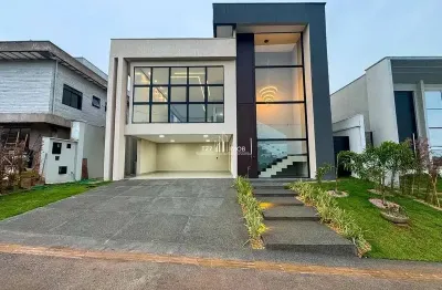 Casa subtérrea com 4 suítes plenas sendo uma master com closet.