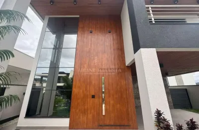 Belíssima casa 4 dormitórios sendo 3 suítes 2 com closed 4 vagas