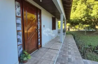 Casa em condomínio fechado com 3 quartos à venda na Rua Sol Nascente, 78, Martinica, Viamão por R$ 590.000