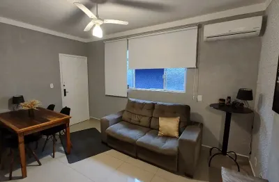 Aluguel de apartamento mobiliado  de 65 m2 com 2 dorms , 2 banheiros na ponta da praia em santos-sp