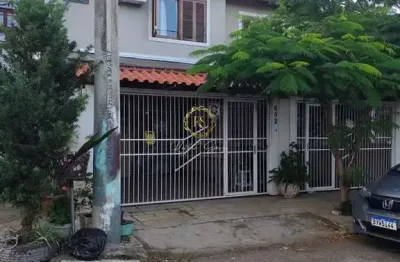 Casa à venda na Rua Coronel Camisão, 602, Harmonia, Canoas