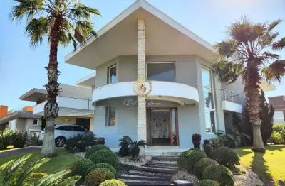 Majestosa  casa a venda no condomínio ocean side em torres/rs