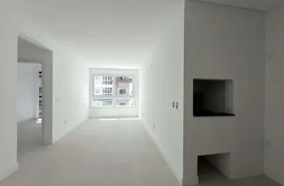 APARTAMENTO À VENDA COM SACADA DE FRENTE!!! 2 dormitórios, suíte e box - Zona Nova -  Capão da Canoa