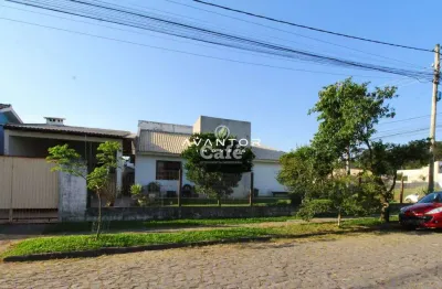 Casa à venda com 3 dormitórios 3 banheiros 2 vagas de garagem e amplo pátio.